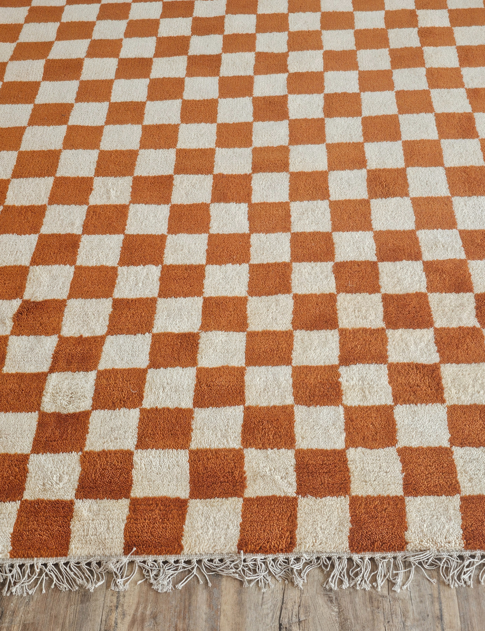 orange and white checkered rug