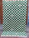green and white checkered rug