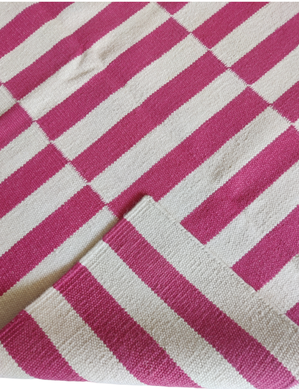 pink and white striped rug